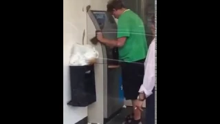 Drunk Man Trying To Use ATM Gets Blasted By His Beer