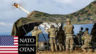 U.S. Army, NATO. Soldiers and M777 howitzers during combat exercises in Germany.