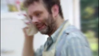 Michael Sheen being chaotic on The Great British Bake Off