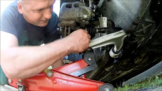 How to replace front lower arm on OPEL VECTRA C