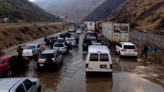 Mudslides trap hundreds of cars on major Calif. freeway