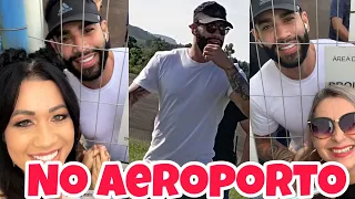 Gusttavo Lima chegando no aeroporto e fala com os fãs