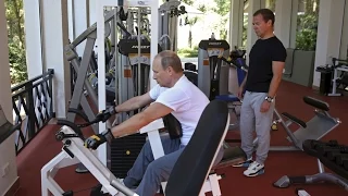 Vladimir Putin  and PM Dmitry Medvedev pumping iron