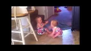 Twin Babies Laughing at Each Other