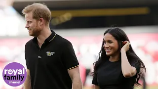 Duke and Duchess of Sussex sit among the crowd during MLB London Series baseball game