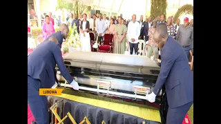 SAD MOMENTS AS APONYE'S BODY IS RECEIVED AT HIS HOME IN LUBOWA-KAMPALA.