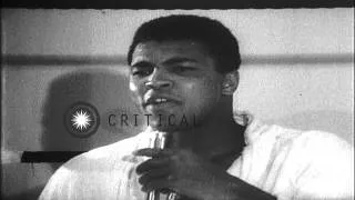 Cassius Clay (later Muhammad Ali) practices at the Astrodome and speaks in Housto...HD Stock Footage