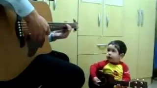 Padre e hijo cantando don't let me down The beatles By: Monse