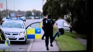 man on traffic cops trying to escape