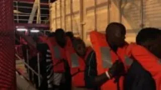 Migrants moved to coast guard vessel off Lampedusa