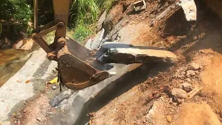 Chemical blasted rock demonstration and remove using caterpillar