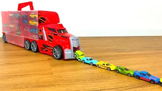 Lot of Tomica Cars sliding down from big red truck Transporter #3