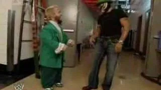 Hornswoggle says "Good bye" to Rey Mysterio