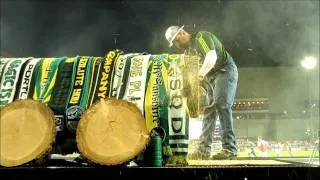 Timber Joey saws off a log slice after the third Timbers goal vs. LA