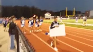 High school QB asks opposing team cheerleader