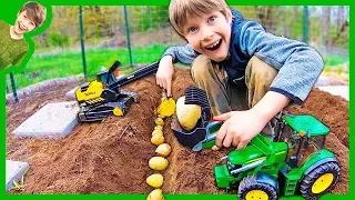 Tractors Plant Potatoes!