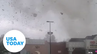 Terrifying video shows Michigan tornado barreling towards couples car | USA TODAY