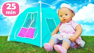 Baby Annabell doll goes camping. Baby doll plays at the beach & clothes for baby dolls.