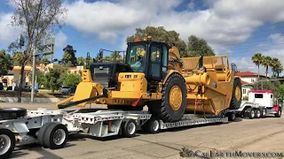 Hauling a brand new CAT 657 scraper from dealership to jobsite