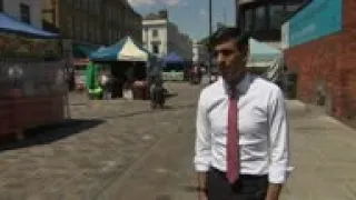 UK chancellor visits market marking lockdown ease