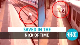 Watch: Man stuck on rail track saved just as train arrives at Mumbai station