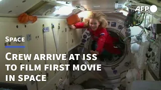 Russian crew arrives at the ISS to film first movie in space | AFP