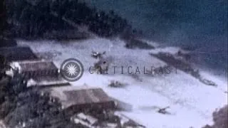 Enemy ships endure strafing by U.S. warplanes in the Pacific. HD Stock Footage