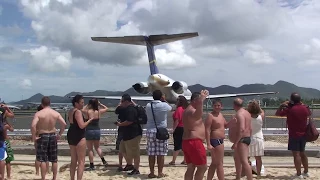 Wife recording jet blast but gets way too close in St. Maarten