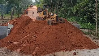Motor Grader Spreading Soil After Crossing Two Sides of Box Culvert