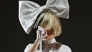 Sia Accidentally Exposes Her Face During Windy Concert in Colorado -- See the Pics!