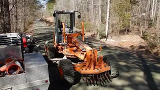 Grading A Road With The Motor Grader