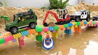 Bridge Construction Vehicles On The Water | Excavator Crane Truck Toy Stories | BIBO STUDIO