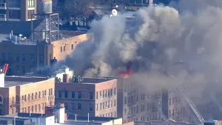 5-alarm fire burns through Queens apartment building