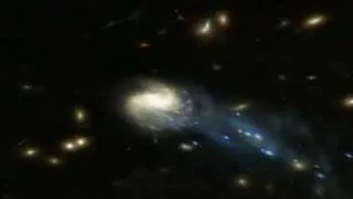 Galaxy ripped by Galaxy cluster