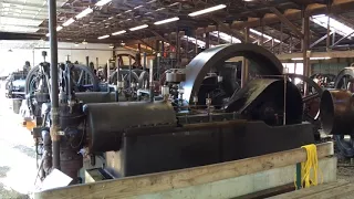 Huge Hit and Miss Engine Running at Rough and Tumble