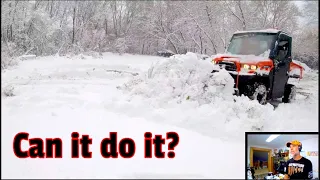 UTV plowing deep snow