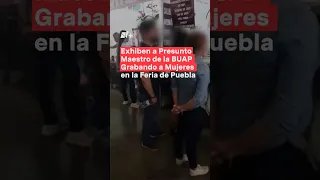 Exhiben a presunto maestro de la BUAP grabando a mujeres en la feria de Puebla - N+ #Shorts