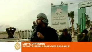 Libyan forces push rebels back