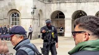 Enough of Your Silly ARGUMENT, MOVE BACK NOW - Armed Officer has Had Enough of this Chinese Man