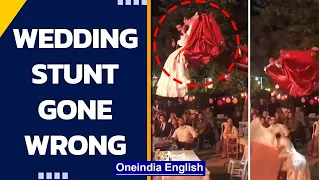 Couple fall from JCB on wedding day as stunt goes wrong: Viral video | Oneindia News