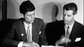 November 4, 1952 - John F. Kennedy and Robert F. Kennedy reviewing US Senate Election results