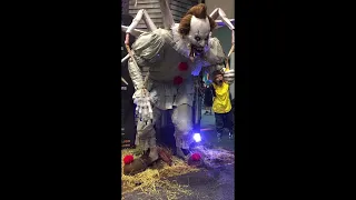 Pennywise and Georgie life size animatronic at Transworld Halloween and Haunt convention