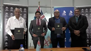 Fijian Attorney-General officiates at the signing between the Fijian Government and Counter Ruck Ltd