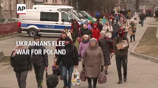 Ukrainians flee war for Romania and Poland