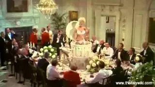 Virna Lisi - emerges from the cake