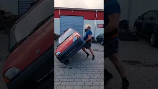 destroy a car in strongman style. #destroy #car #strongman #style