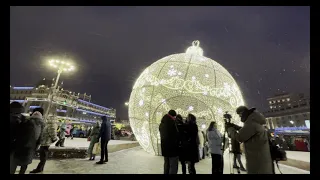 Walk in Bolshoi theatre square with Christmas lights, Moscow, Russia