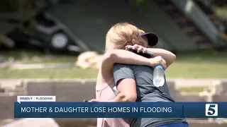 Neighbors reunite after flooding destroys homes