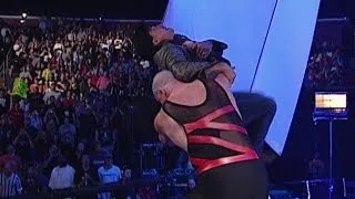 Kane chokeslams Eric Bischoff off the stage