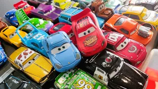 Disney Pixar Cars fall into the water: Lightning McQueen, Natalie Certain, Jackson Storm, Doc Hudson
